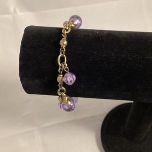 Goldtone and purple Fifth avenue collection bracelet